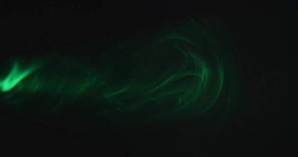 Green smoke on a black background — Stock Video