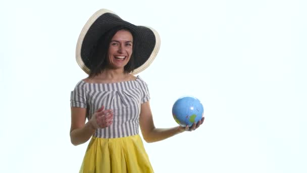 Woman holding globe isolated white background — Stock Video