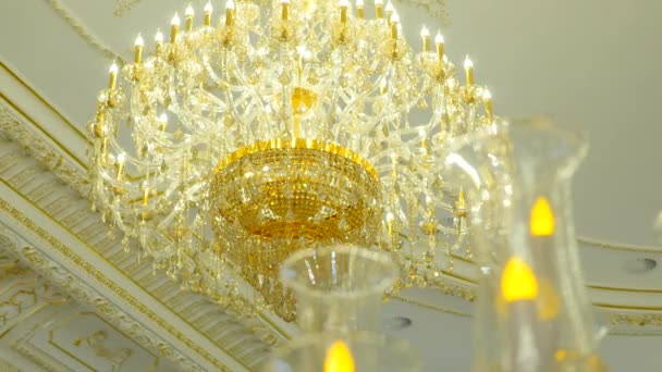 Elegant chandelier on the ceiling in a luxury restaurant — Stock Video