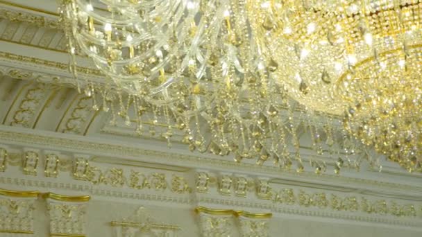 Elegant chandelier on the ceiling in a luxury restaurant — Stock Video