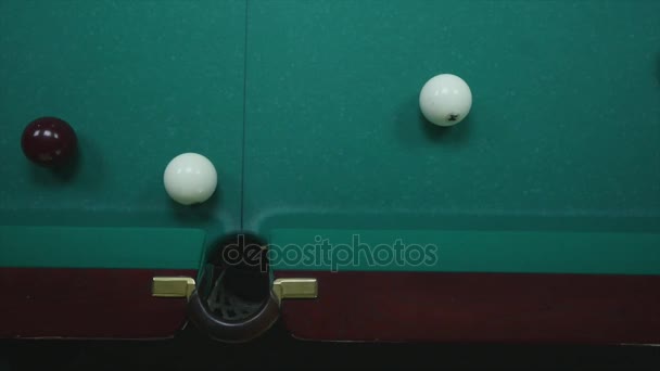 Sports game of billiards. Billiard ball rolls on the table — Stock Video