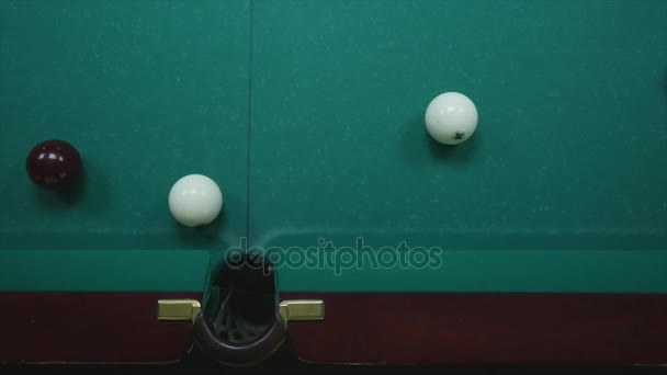 Sports game of billiards. Billiard ball rolls on the table — Stock Video