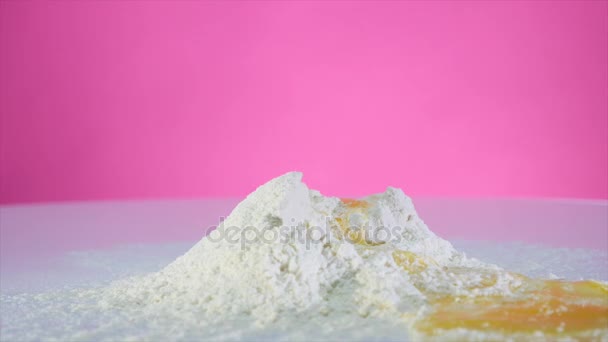 The egg is spilled on the flour — Stock Video
