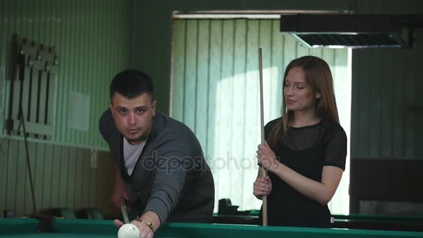 Young people playing billiard in a club pub bar — Stock Video