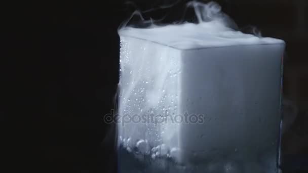 Drink in glass with the effect of dry ice — Stock Video