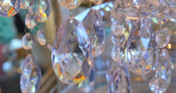 Luxury crystals of a classic chandelier.Close up beautiful crystals of a luxury chandelier. Candy bar background — Stock Video