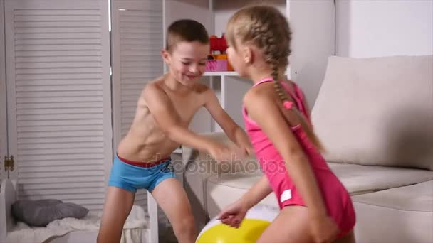 Two joyful kids showing their blotted palms — Stock Video