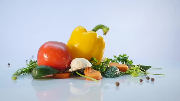 Big group of vegetables on white background — Stock Video