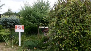 bush arasında Satılık işareti