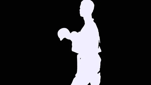 Junge Karate macht Rack auf schwarzem Hintergrund, Silhouette — Stockfoto