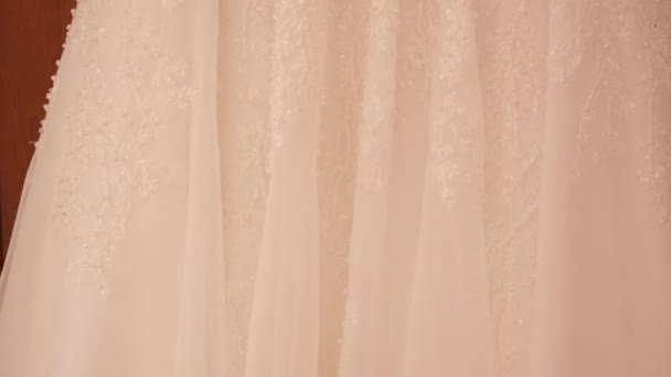 Wedding dress on hanger. close up — Stock Video