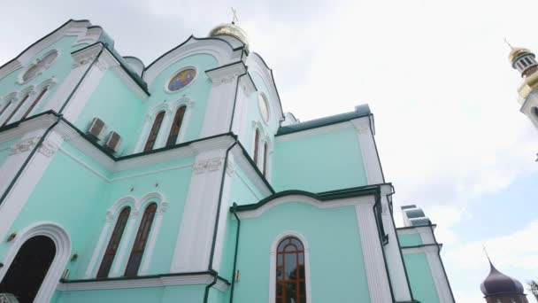 Green Walls of Church on Blue Sky on a Background — стоковое видео