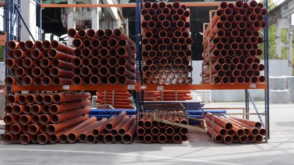 Many plastic pipes for sewage systems in warehouse — Stock Video