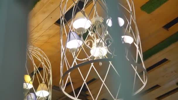 Chandelier in a restaurant, interior element — Stock Video