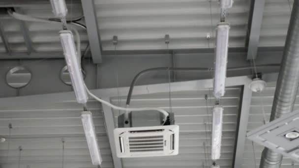 Cassette type air conditioner blowing cold air — Stock Video