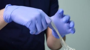 El tutma şişirilmiş prezervatif