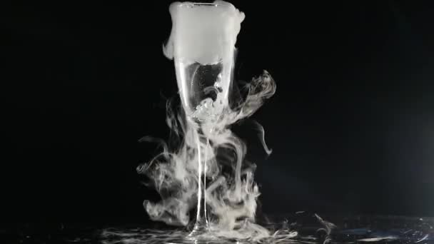 Boiling dry ice in a water with dense vapor — Stock Video