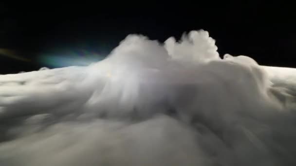 Close-up of ice smoke in bowl against black background — Stock Video