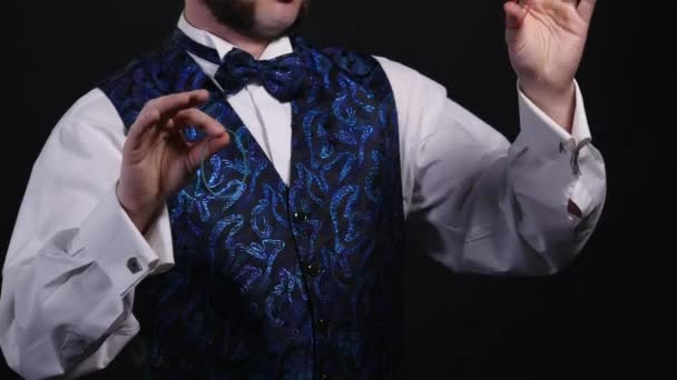 Magician showing trick with clerical gum, hands closeup. illusionist — Stock Video