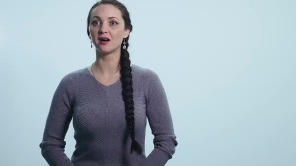 Portrait of young surprised and shocked young woman — Stock Video