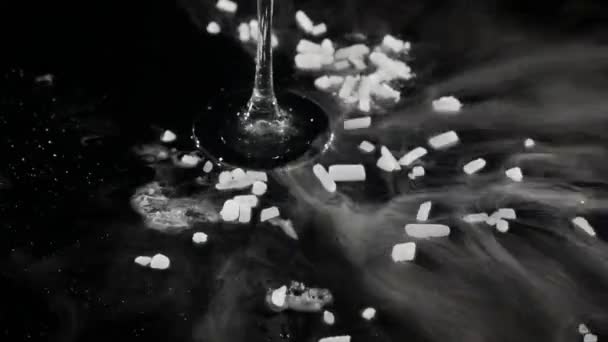 Pieces of dry ice on the table evaporate — Stock Video