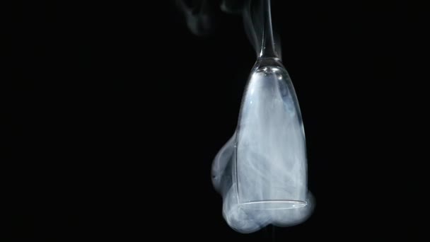 Smoke in the glass on black background — Stock Video