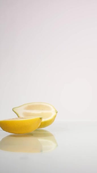 Two half of the lemon on a white background — Stock Video