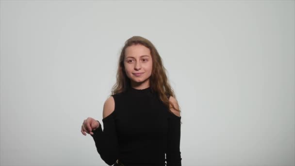 Beautiful redhead girl showing different emotions on white background — Stock Video