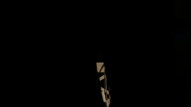 Violinist man playing the violin on a black background. Close up — Stock Video