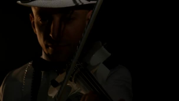 Musician playing a violin on black background — Stock Video