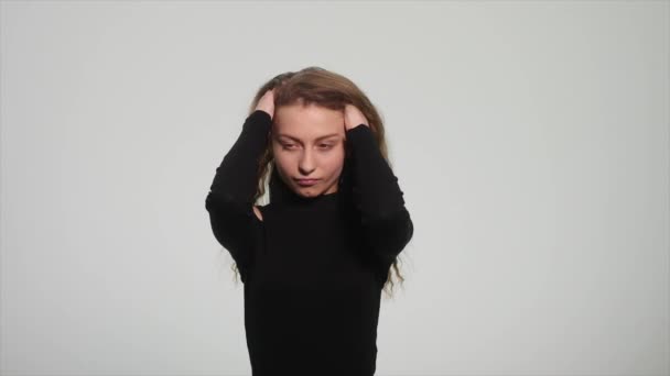 Depressed teenager is sad on white background. — Stock Video