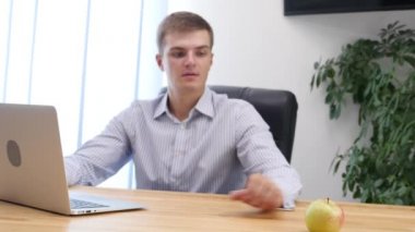 Businessmans hands type at desktop keyboard in workspace. Blurred background. Close up. Copy space. Crop. 4K.