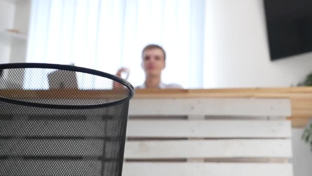 Man throws away paper documents into the office bin. Close up. Copy space. 4K. — Stock Video