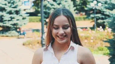 Young attractive blond woman is happy and satisfied. Action. Movement. 4K.