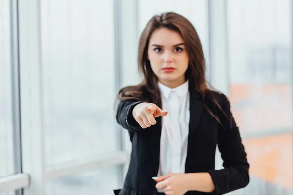 Closeup portrait of young serious woman pointing at someone as if to say you did something wrong, your fault. Negative human emotions concept. — 스톡 사진