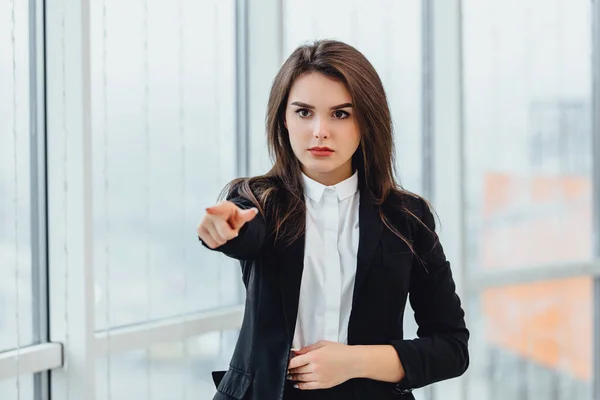 Will you join my team Young woman in suit pointing at camera, looking confident and determined. — Stock Photo, Image