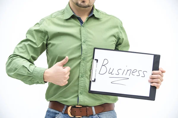 Cropped shot of senior bussines man showing the thumb up sign while holding business word sign on gray background. — Stock Photo, Image