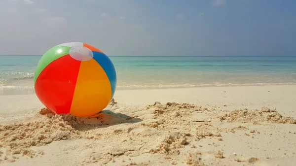 P00213 Maldives white sandy beach ball on sunny tropical paradise island with aqua blue sky sea ocean 4k
