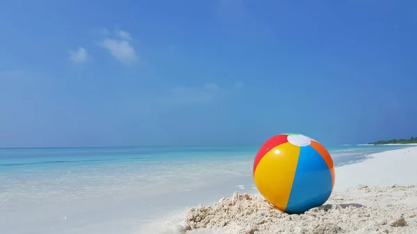 P00221 Maldives white sandy beach ball on sunny tropical paradise island with aqua blue sky sea ocean 4k