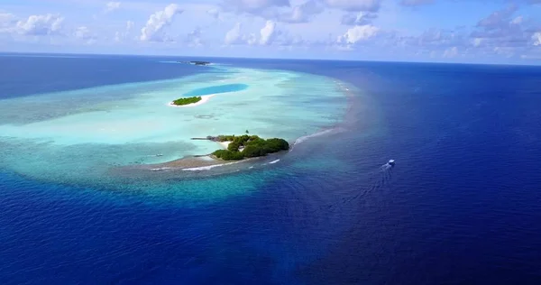 v11710 maldives white sand beach tropical islands with drone aerial flying birds eye view with aqua blue sea water and sunny sky