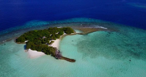 v15098 maldives white sand beach tropical islands with drone aerial flying birds eye view with aqua blue sea water and sunny sky