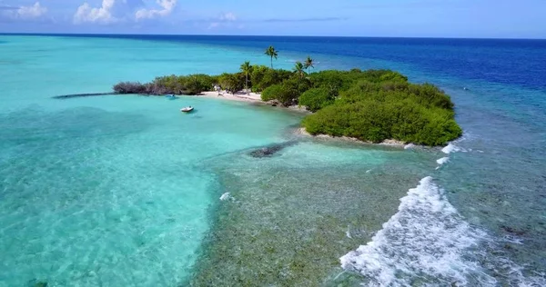 v14507 maldives white sand beach tropical islands with drone aerial flying birds eye view with aqua blue sea water and sunny sky