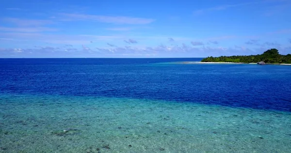 v14556 maldives white sand beach tropical islands with drone aerial flying birds eye view with aqua blue sea water and sunny sky