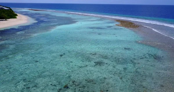 v14565 maldives white sand beach tropical islands with drone aerial flying birds eye view with aqua blue sea water and sunny sky