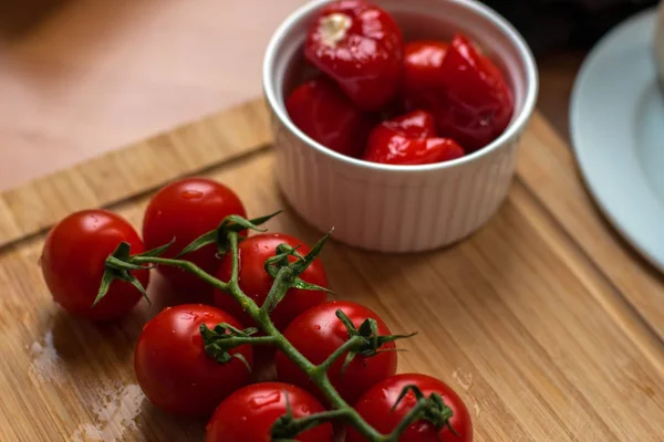 Cherry tomatoes on the vine Stock Image