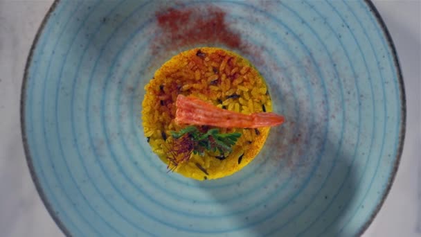 Saffron and shrimp risotto top view — Stock Video