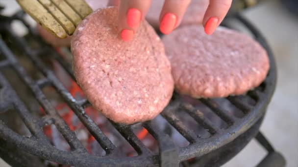 Beef meat patty barbecue burgers for hamburger prepared grilled on bbq fire flame grill — Stock Video
