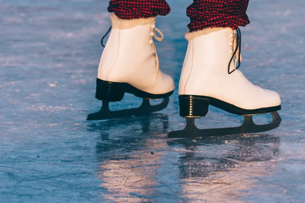 Close-up of woman skating on ice