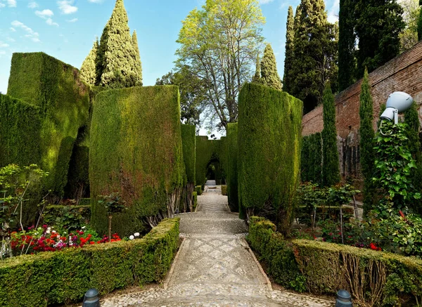 The Alhambra Palace, gardens, castle, watch tower and more in complex at Granada, Spain.