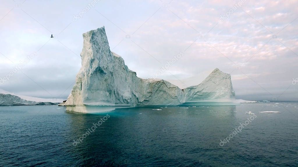 Huge iceberg on arctic ocean in greenland